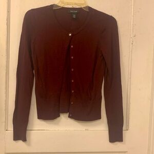 White House Black Market burgundy colored light weight cardigan.